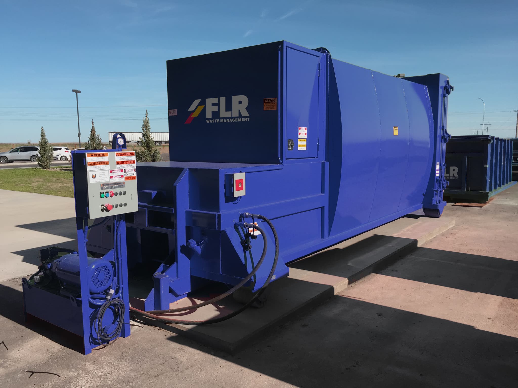 Fenceline garbage compactor