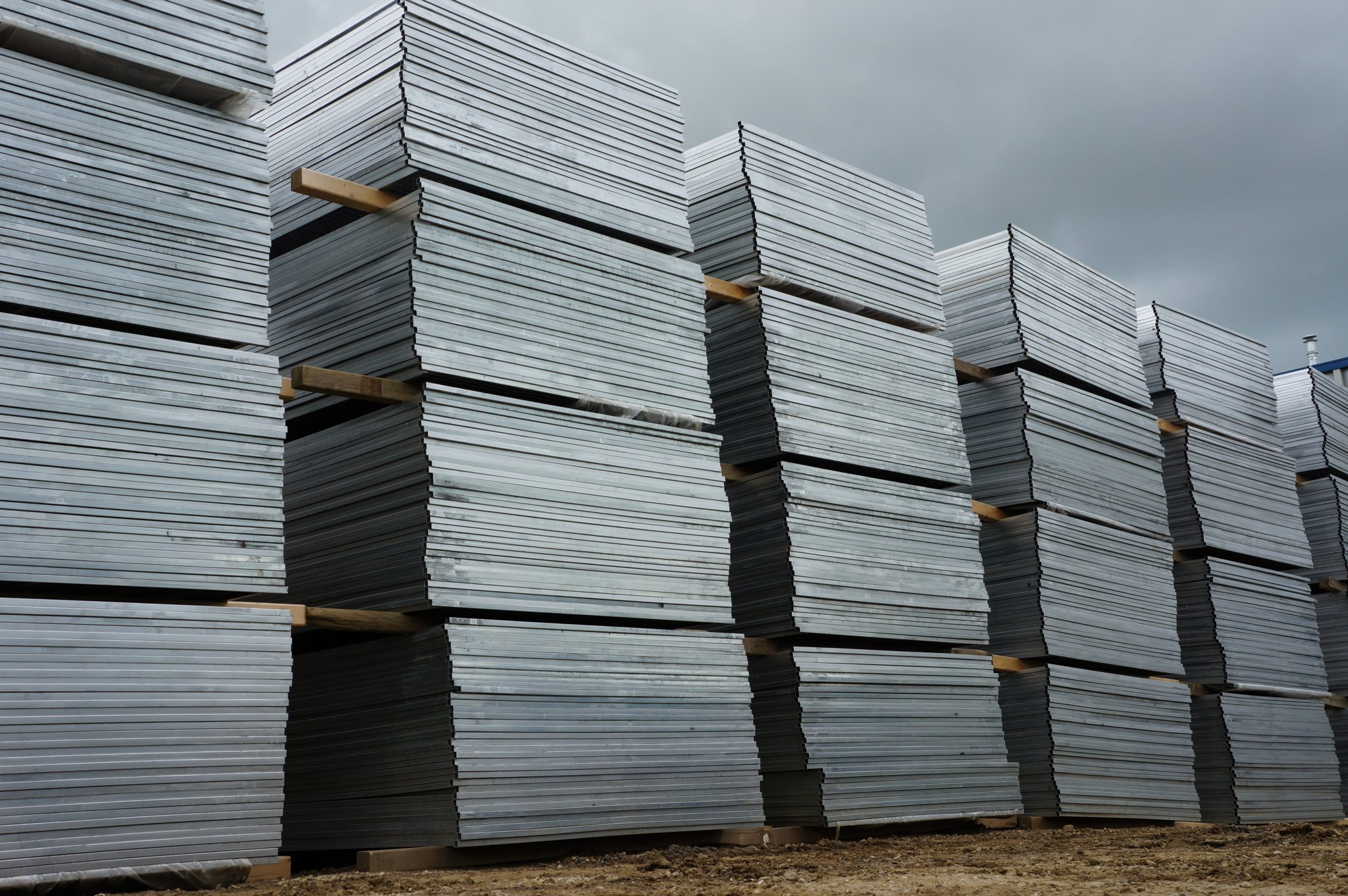Stacks of temporary fence panels