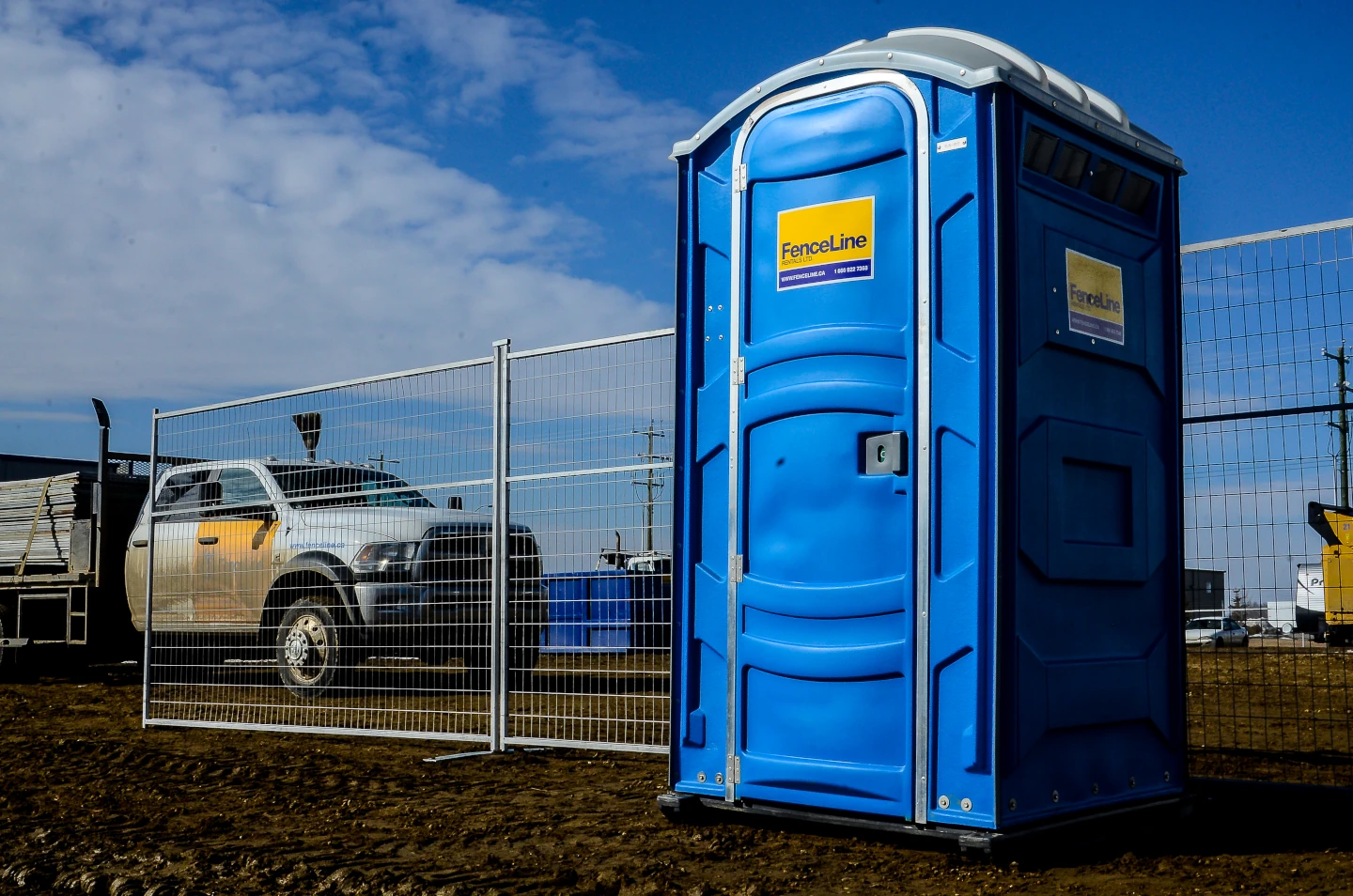 Porta Potty and portable fence at a construction site 
