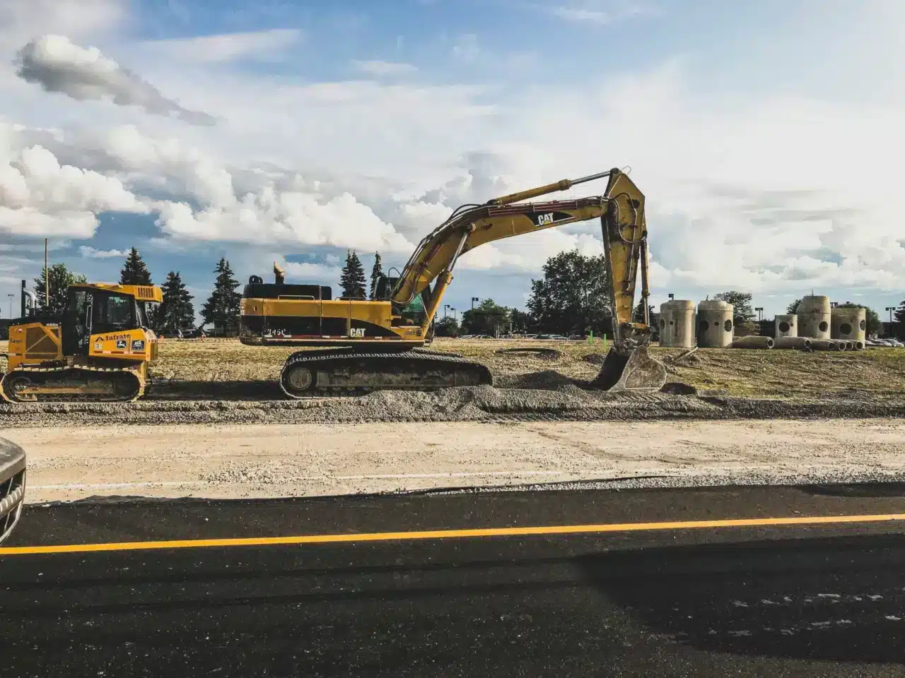 Large construction equipment on the side of a road at a construction site outside of Edmonton.