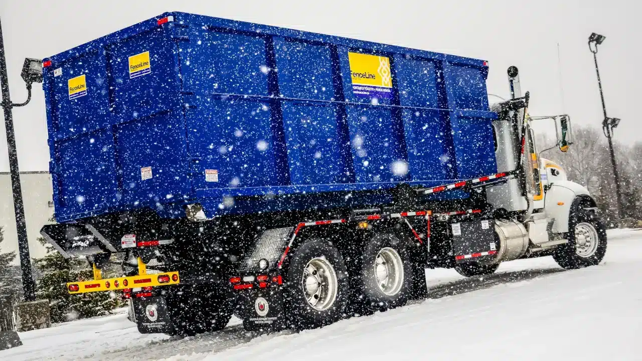 A FenceLine truck delivers recycling.
