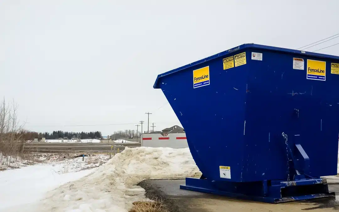 a self tipping waste bin on a remote construction site in Alberta
