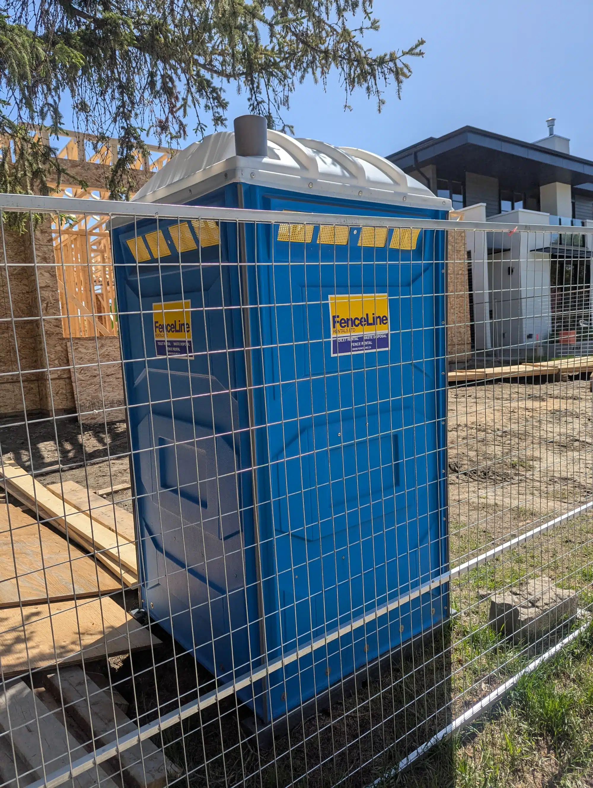 Porta potty in a home construction site