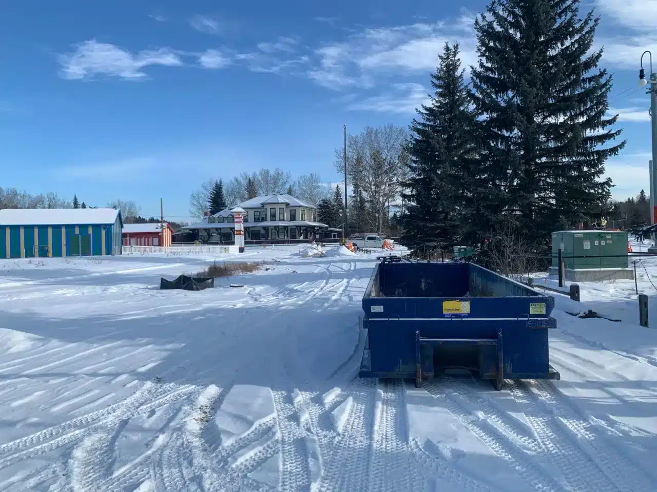 A construction site in Calgary is abandoned on a snowy day.